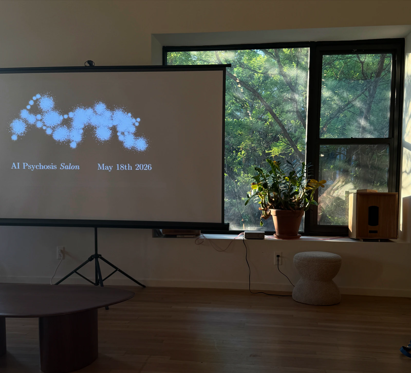 Attendees in discussion at the AI Psychosis Salon